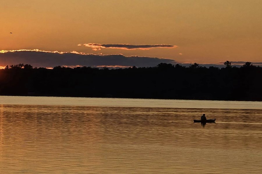 Kayaker on Grace Lake at golden hour